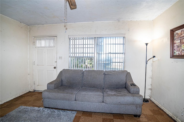 living room featuring ceiling fan