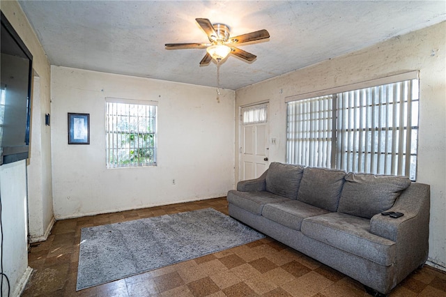 living room featuring ceiling fan