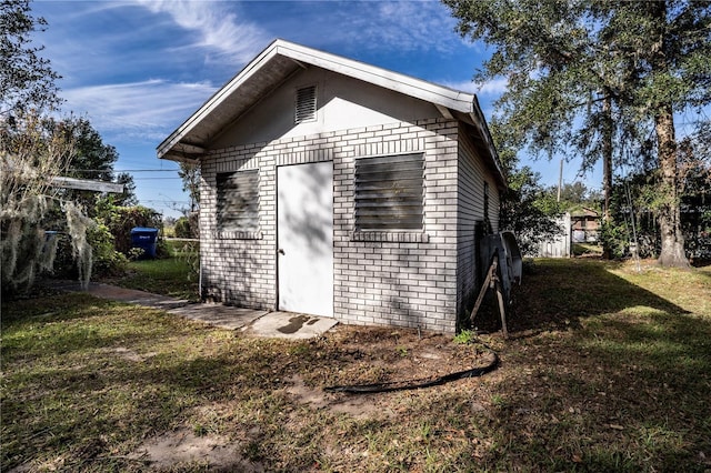 view of outdoor structure with a yard