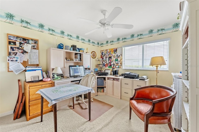 carpeted office with ceiling fan