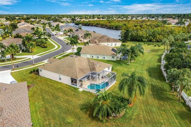 drone / aerial view with a water view