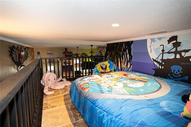 bedroom with crown molding