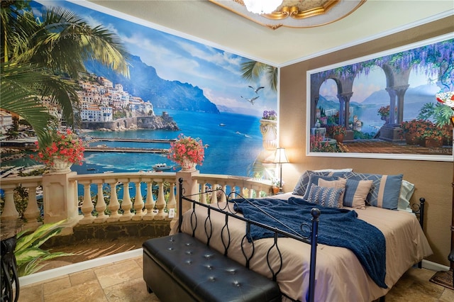 bedroom featuring a water view and crown molding