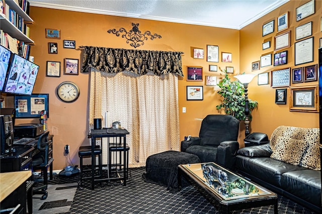 living room featuring a textured ceiling and ornamental molding