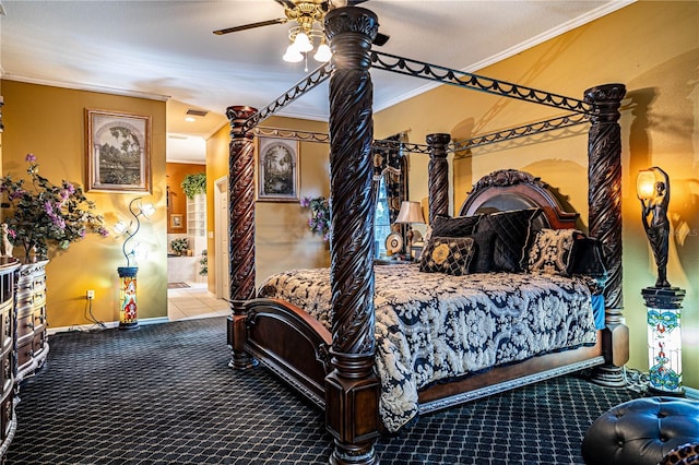 bedroom featuring ensuite bath, ceiling fan, carpet floors, and ornamental molding