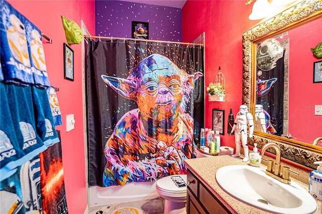 full bathroom featuring vanity, toilet, and shower / bath combo with shower curtain