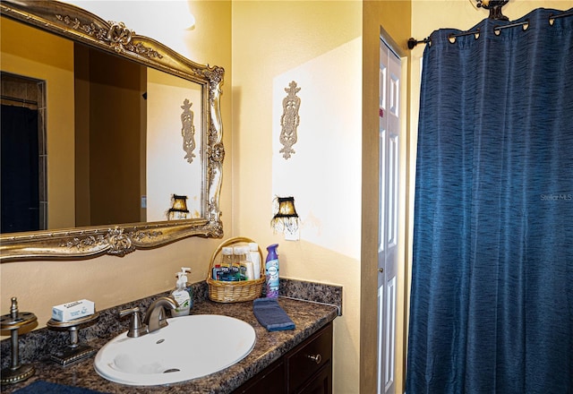 bathroom with vanity and walk in shower