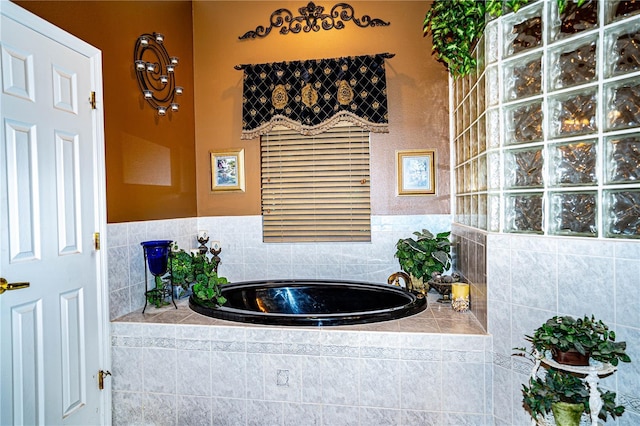 bathroom featuring tiled bath