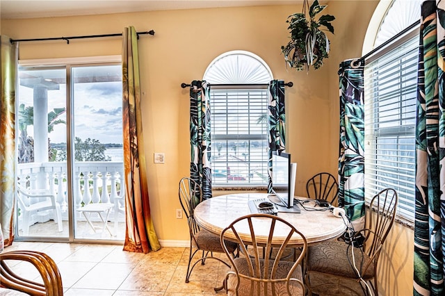 dining room featuring light tile patterned floors