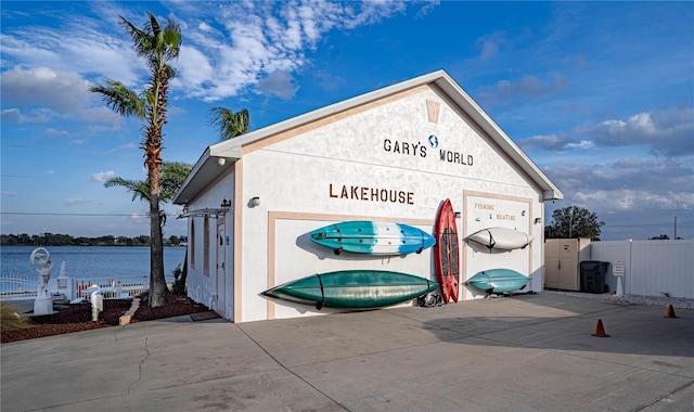 exterior space with a water view