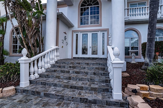 doorway to property with french doors and a balcony