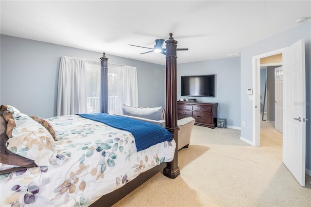 bedroom featuring ceiling fan and light colored carpet