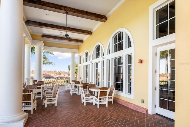 view of patio featuring ceiling fan and french doors