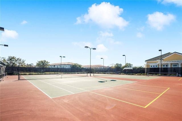 view of tennis court with basketball court