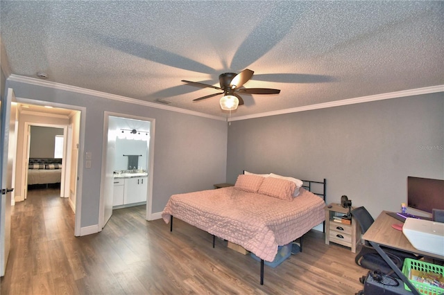 bedroom featuring ceiling fan, dark hardwood / wood-style flooring, ensuite bathroom, crown molding, and a textured ceiling