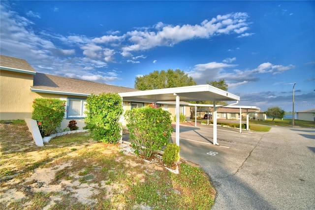 view of property's community featuring a carport