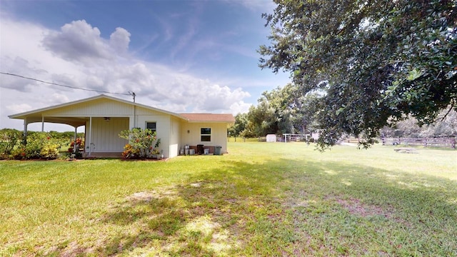 view of yard featuring a carport