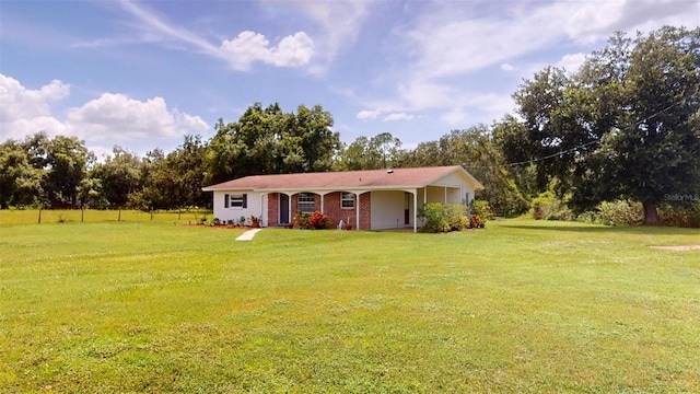 view of front of house featuring a front yard