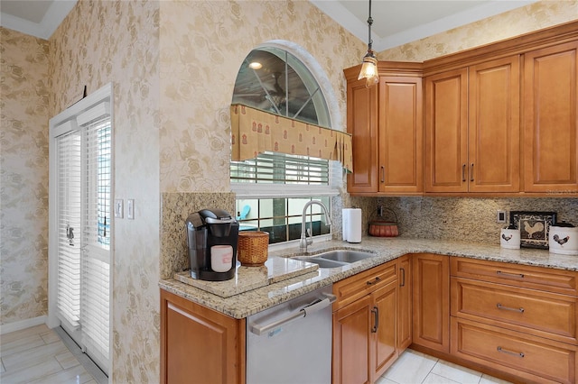 kitchen featuring light tile patterned floors, dishwasher, sink, and light stone counters