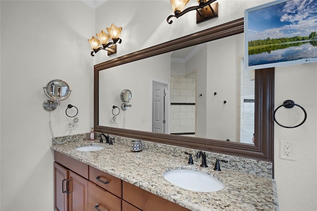 bathroom with vanity and crown molding