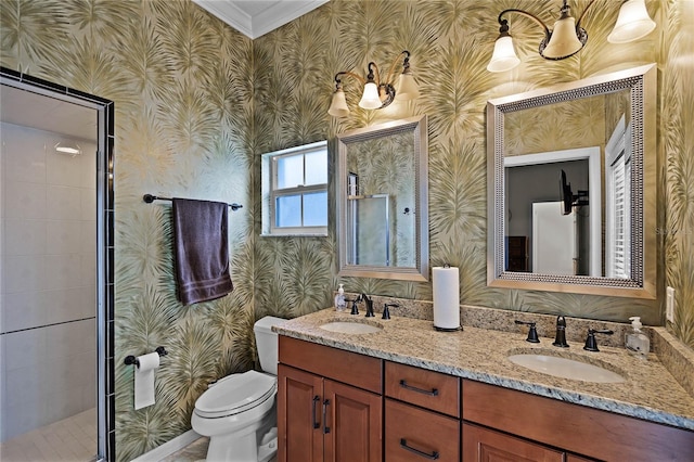 bathroom with toilet, crown molding, an enclosed shower, and vanity