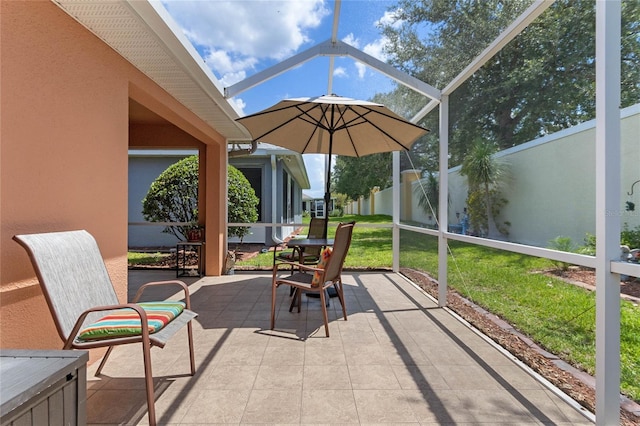 unfurnished sunroom featuring vaulted ceiling