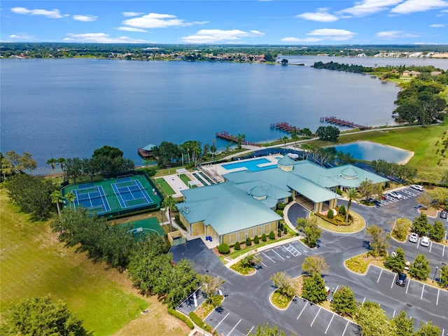 birds eye view of property with a water view