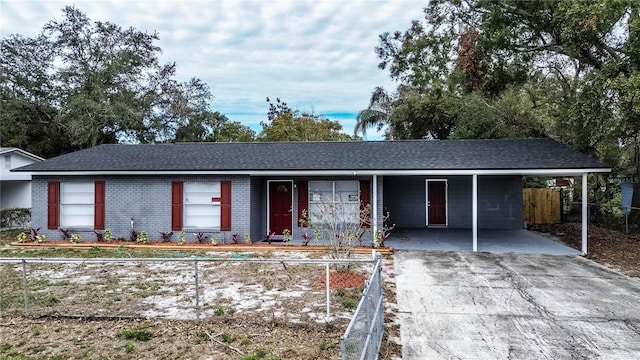 ranch-style house with a carport