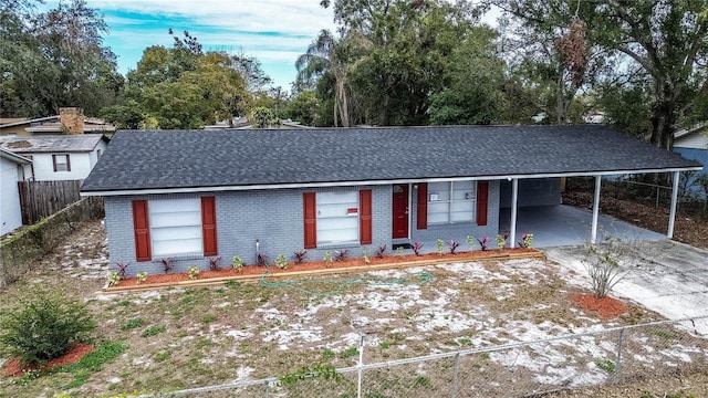 ranch-style home with a carport