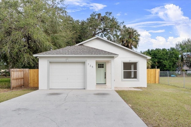 single story home with a garage and a front yard