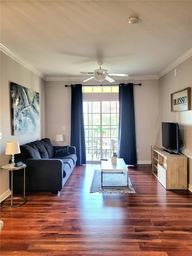 living room with ceiling fan, dark hardwood / wood-style flooring, and ornamental molding