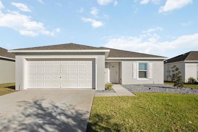 single story home with a garage and a front lawn