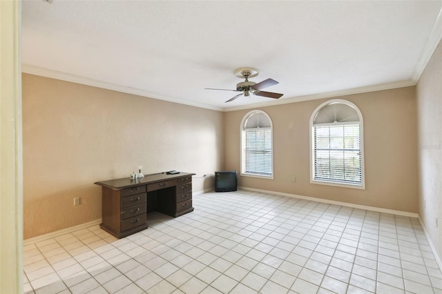 unfurnished office featuring light tile patterned floors, ceiling fan, and ornamental molding