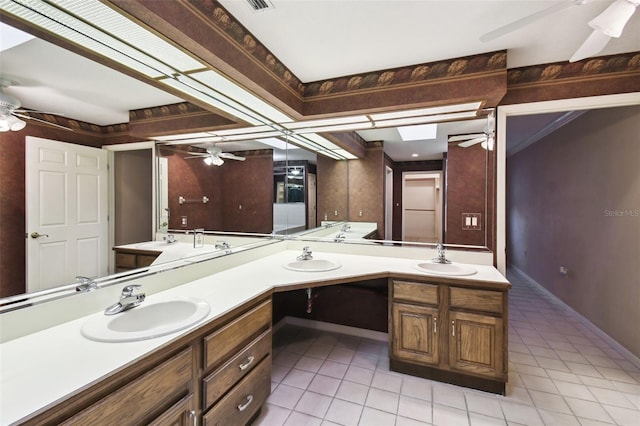 bathroom with vanity and tile patterned floors