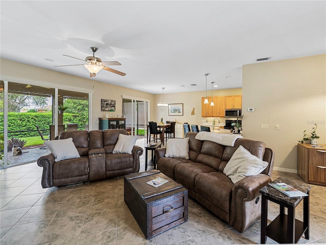 living room with ceiling fan