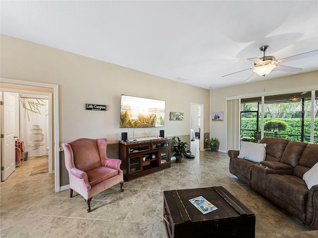 living room featuring ceiling fan