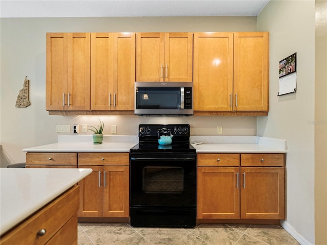 kitchen featuring black / electric stove