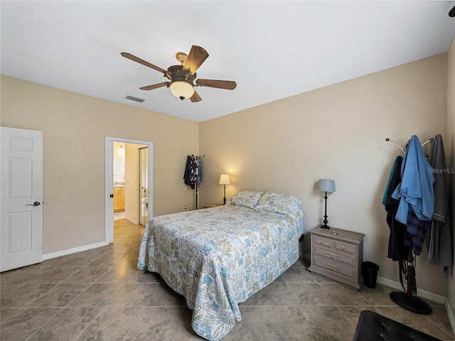 bedroom featuring ceiling fan and connected bathroom