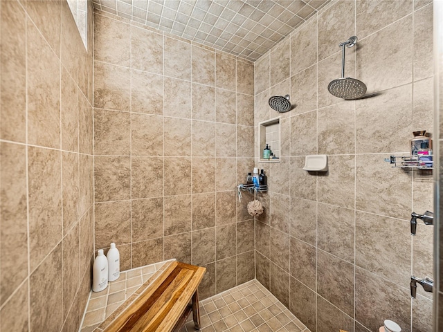 bathroom featuring tiled shower