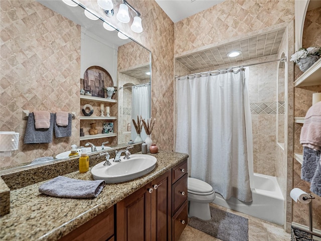 full bathroom featuring shower / bath combination with curtain, vanity, and toilet