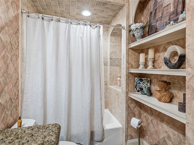 bathroom featuring shower / bath combination with curtain