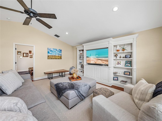 living room with vaulted ceiling and ceiling fan