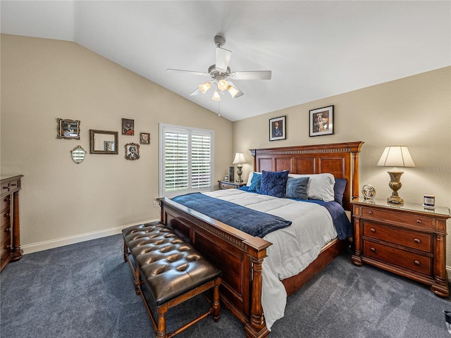 bedroom featuring dark carpet, vaulted ceiling, and ceiling fan