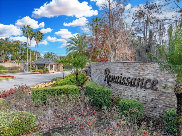 community / neighborhood sign with driveway