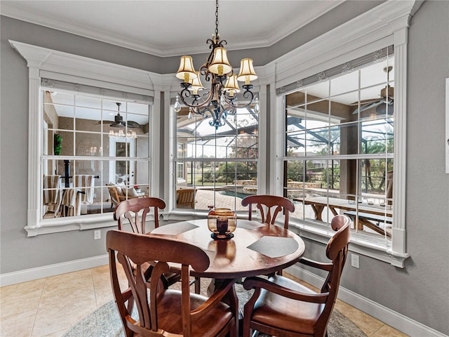 dining area with crown molding, light tile patterned floors, a sunroom, baseboards, and ceiling fan with notable chandelier