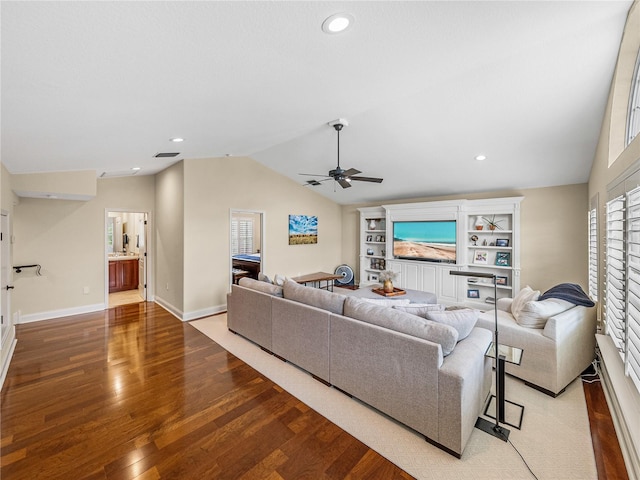 living area featuring recessed lighting, wood finished floors, a ceiling fan, baseboards, and vaulted ceiling