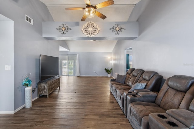 living room with ceiling fan, dark wood-type flooring, and vaulted ceiling