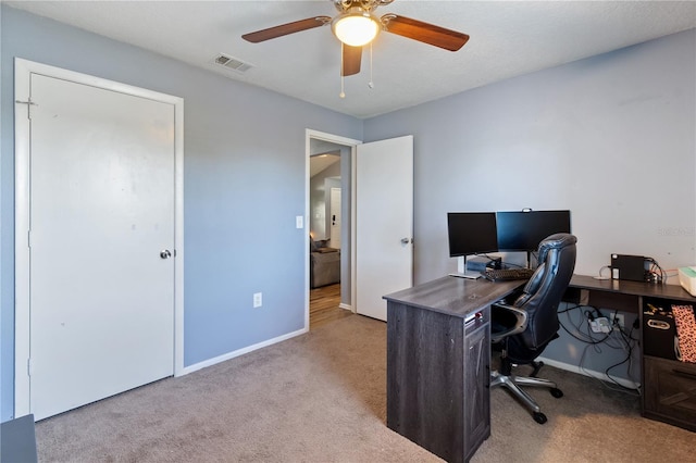 office area featuring carpet flooring and ceiling fan