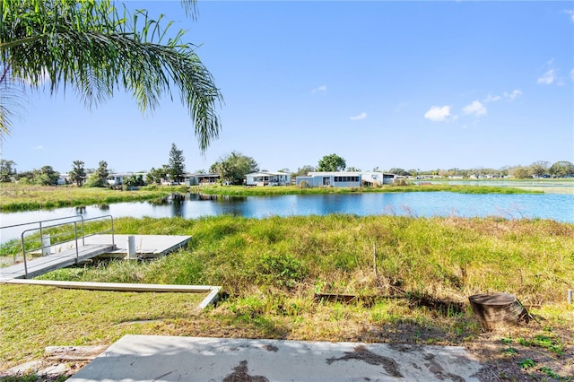 view of water feature with a dock