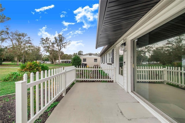 view of patio featuring a porch